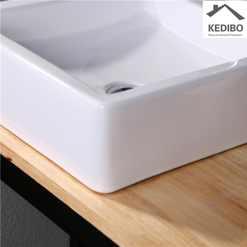 how to choose plumbing products for your bathroom design - storage under wall mounted sink
